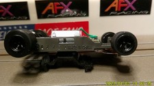 Afx Racing H.o. Scale Mega G 1.7 Narrow Chassis Black 5 Spoke Rims Red Cam Afx Racing H.o. Scale Mega G 1.7 Narrow Chassis Black 5 Spoke Rims Red Cam