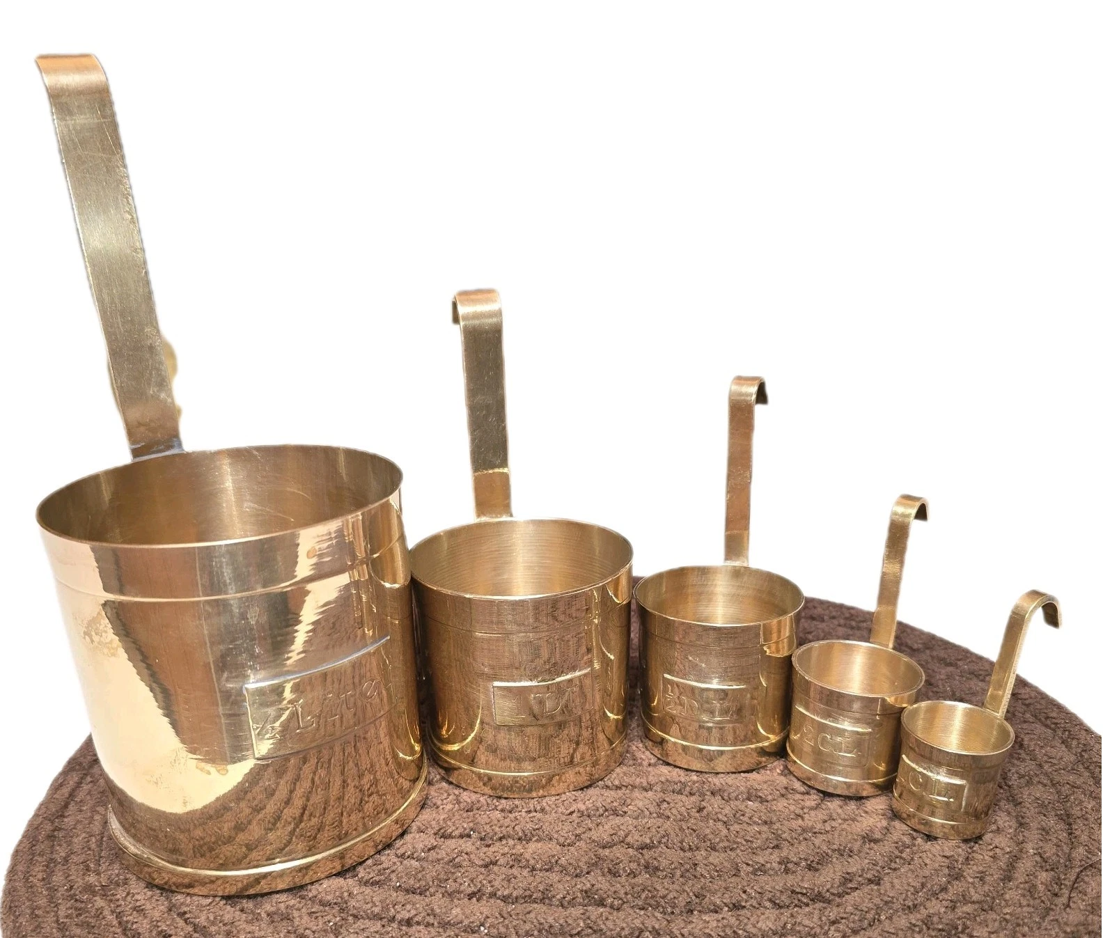 Antique French set of Heavy Brass Measuring Cups set of 5
Opens in a new window or tab