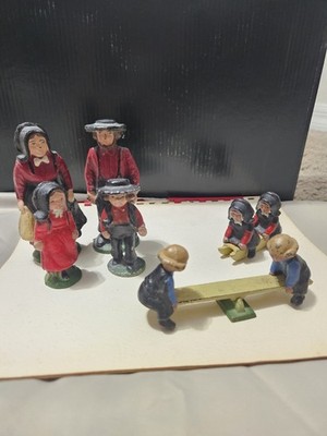 VINTAGE CAST IRON AMISH FAMILY SET OF 8 MINATURES W/TEETER-TOTTER