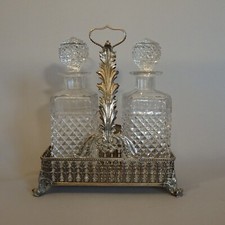 Tantalus in argento con bottiglie in cristallo molato Argenteria Italiana 