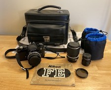 Nikon FE Black 35mm SLR Film Camera w/ Two Lenses 50mm and Zoom 