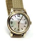 Vintage Timex Gold Tone Watch Mother of Pearl Dial Stretch Band Indiglo Working