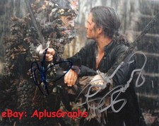 THE PIRATES OF THE CARIBBEAN: DEAD MAN'S CHEST... Bloom with Skarsgard - SIGNED