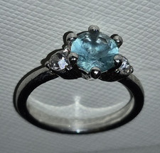 Silver Tone Round Blue Stone Prong Set Solita...