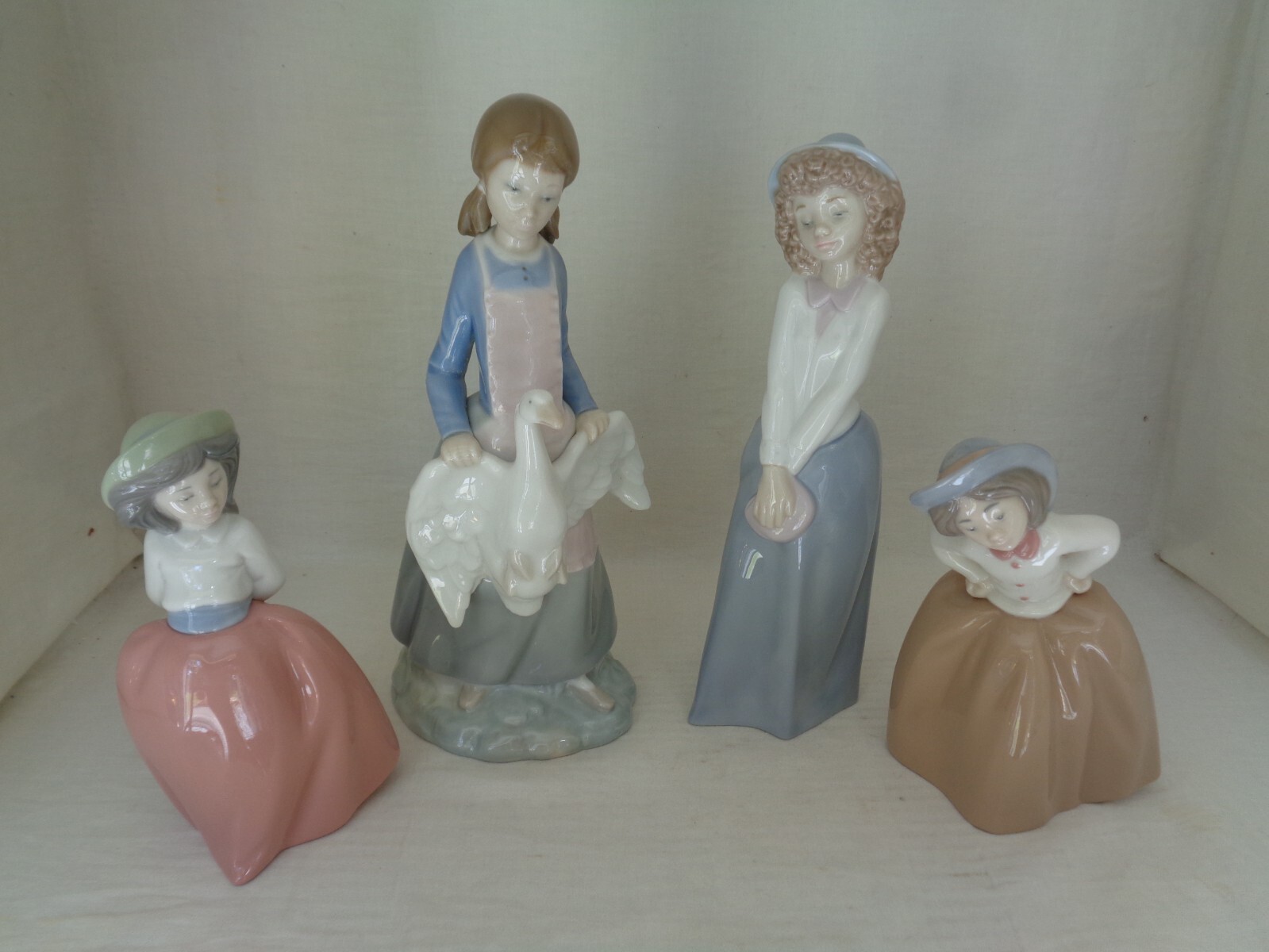 Job Lot Four (4) Nao Figurines eBay