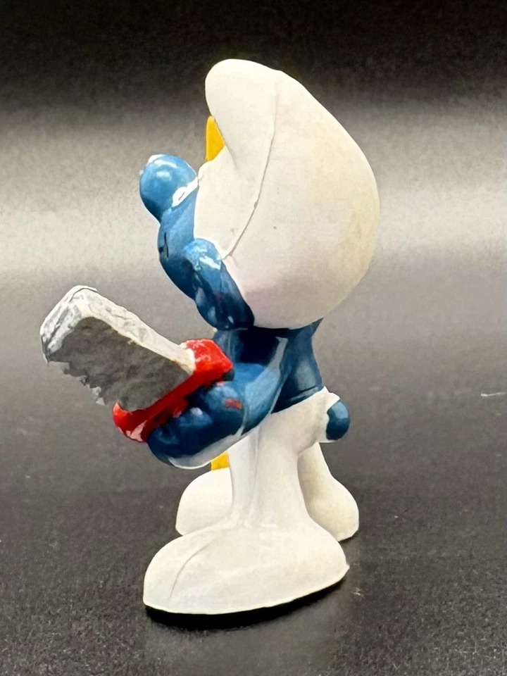 (D) Figura PVC de colección 1978 Schleich pitufo carpintero con sierra y madera Hong Kong Foto 3 de 4