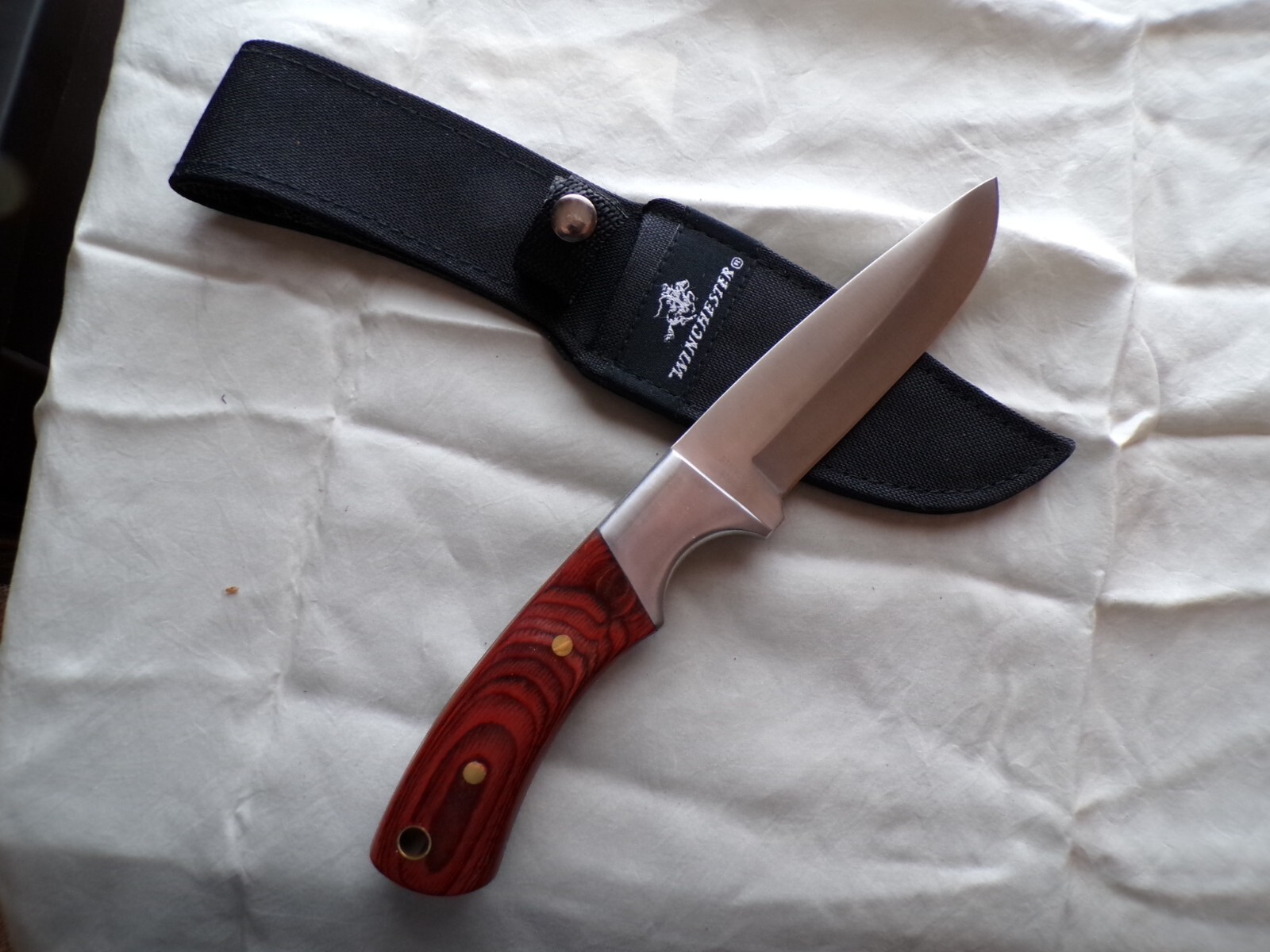 Two (2) Winchester Hunting Knives Wood Handle w/Nylon Sheaths One has