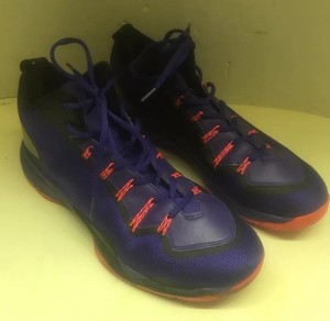 purple and orange basketball shoes