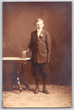 Antique Vintage Real Photo Portrait Young Man Boy Suit Coat Tie Table Book