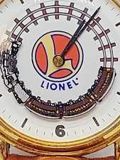 LIONEL COLLECTION WRIST WATCH, FACE WITH TRAIN GOING ROUND, LIONEL LOGO     (OB2
