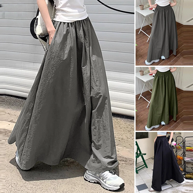 Women Summer Elastic High Waist Pockets Casual Loose Skater A-Line Long Skirt Foto 3 de 4