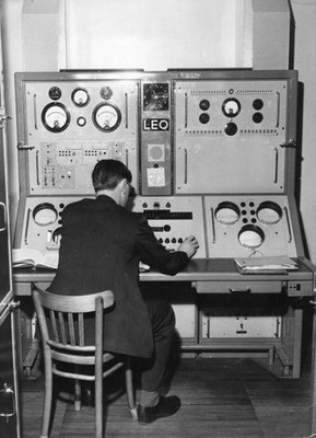 Worker at the control panel of an electronic office Historic Old Photo