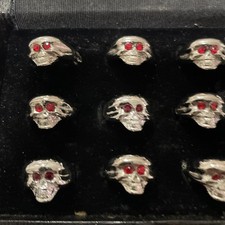 Lot Of 12 VTG NOS Silver Plate Skull Rings Red Eyes Assorted Sizes 