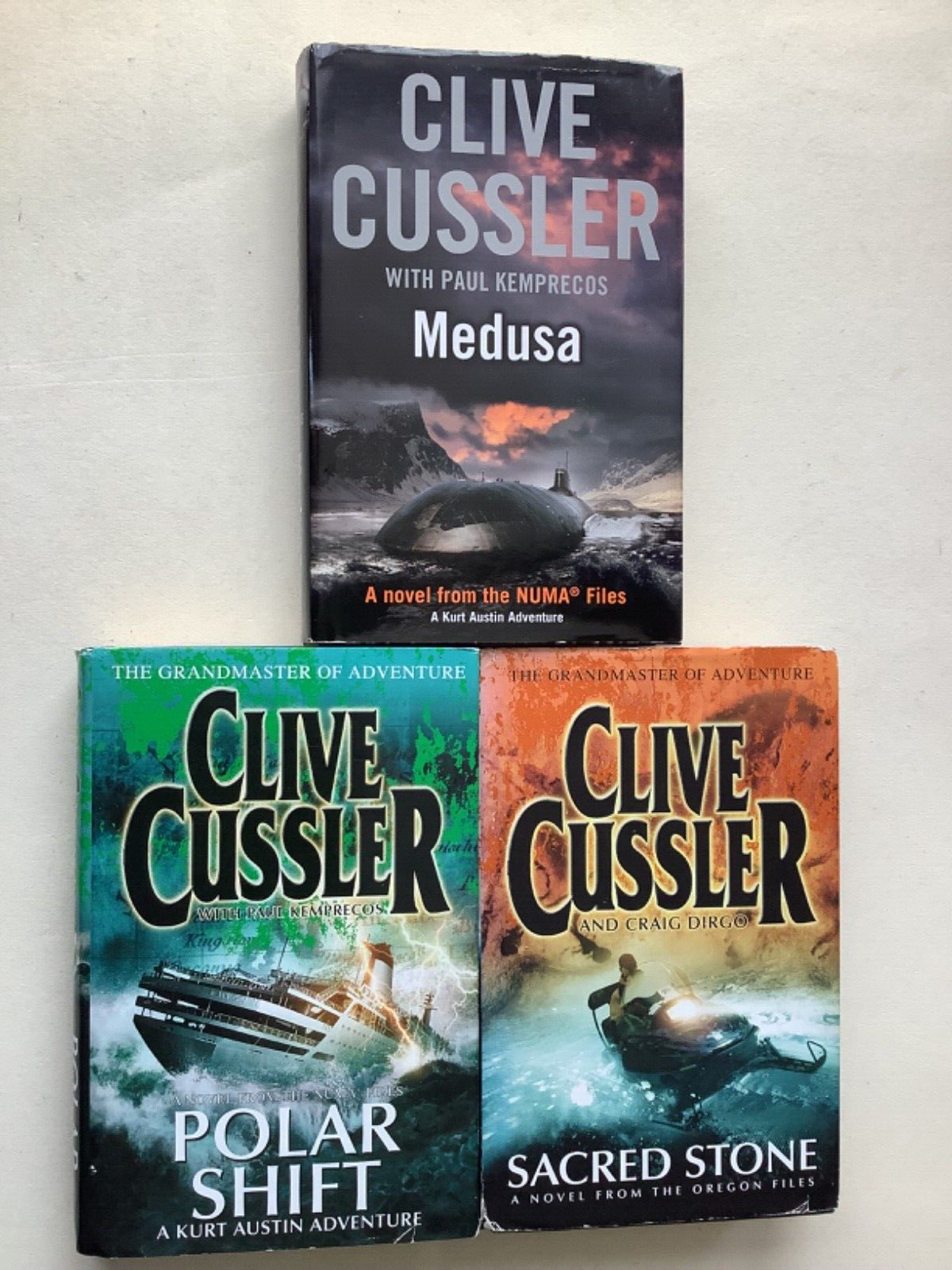 Clive Cussler Book Bundle: Medusa, Polar Shift, Sacred Stone  (Hardbacks)