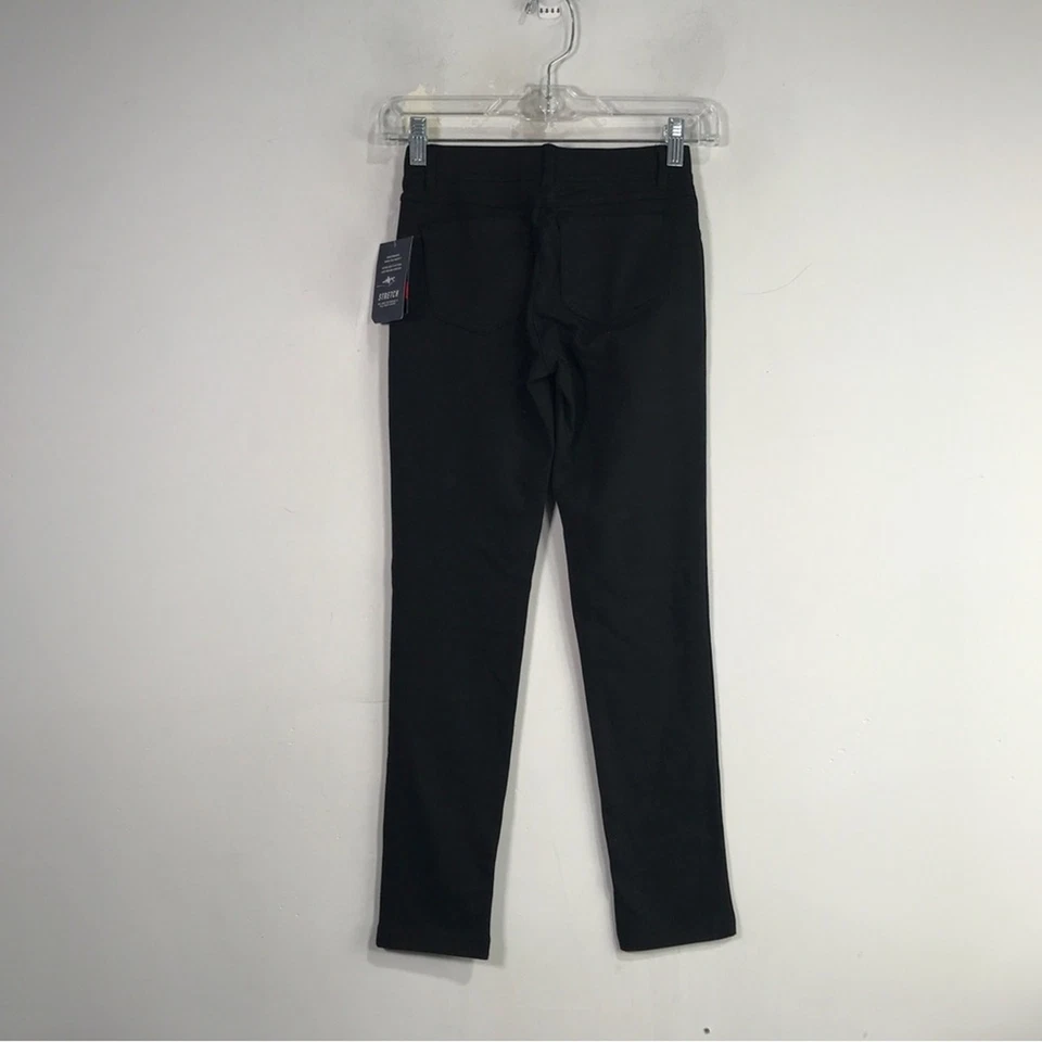 Pantalón elástico Chaps Performance, talla regular 10 para niña - negro Foto 2 de 4