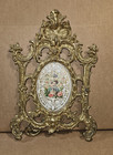 Antique  table vanity mirror features a cast metal brass frame — photo 1