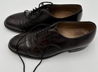 Black leather Johnston & Murphy Optima Burgundy size 11 with closed lacing and tan cushioned insole.
