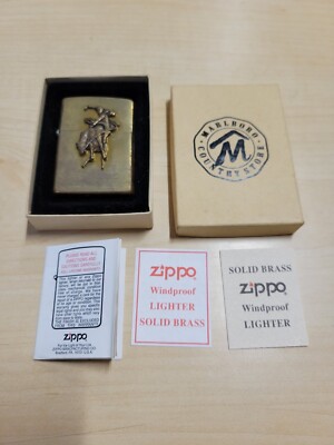 Old Unfired Brass 1994 Marlboro Bucking Bronco Cowboy  Zippo Lighter. 