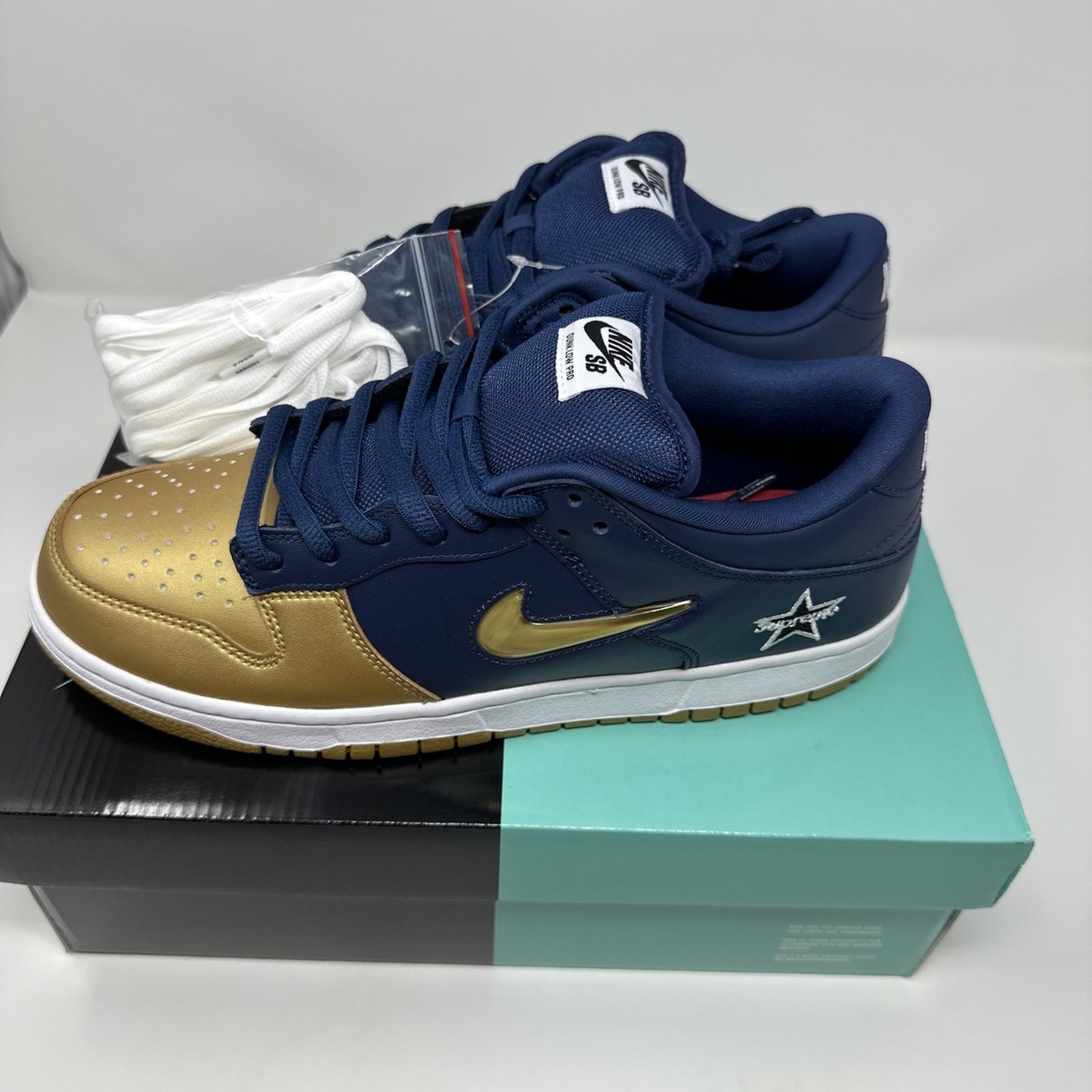 Supreme x Nike Dunk SB Low QS Jewel Swoosh Metallic Gold 