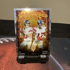 2024 Panini Phoenix ELI MANNING, PLAXICO BURRESS Lazer Treasured Tandems GIANTS