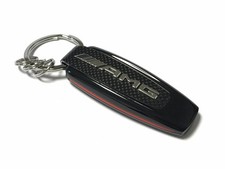 Original Mercedes Benz AMG Typo Schl&uuml;sselanh&auml;nger B66953338 Schwarz Rot C63 E63