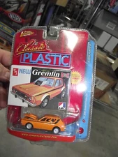 Johnny lightning 1/64 classic Plastic 71 amc gremlin funny car orange NIB