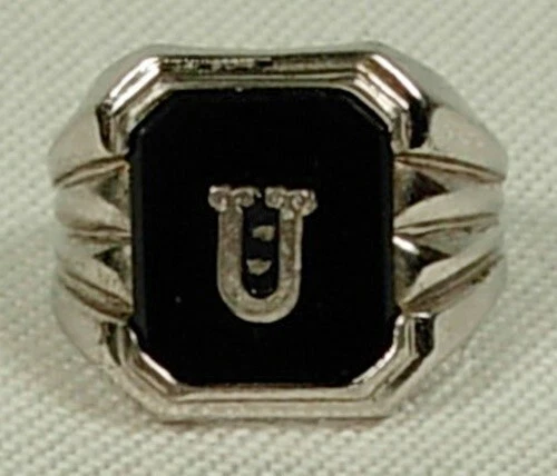 Ring with u shop and arrow through it
