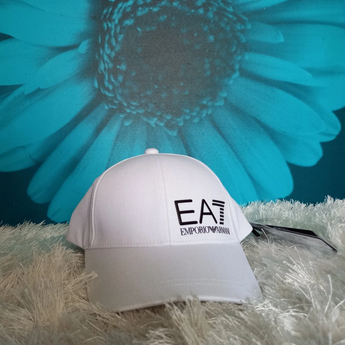White armani cap deals