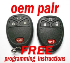 OEM PAIR GM KEYLESS REMOTE ENTRY FOBS TRANSMITTERS CHEVY GMC OUC60221 OUC60270