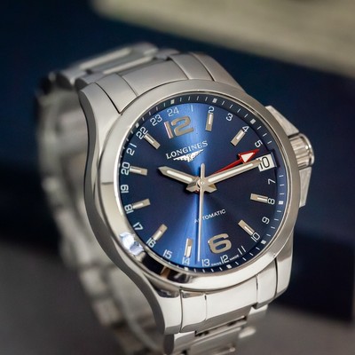Longines  Reference : Conquest GMT L3.687.4 full set blue dial automatic watch