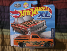 NEW 2026 Hot Wheels XL '83 Chevy Silverado Pickup Truck Orange W/ Flames