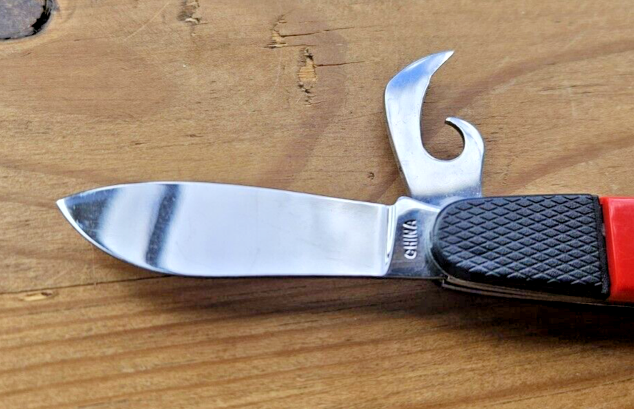 4-in-1 Multi Tool Pocket Knife with 2.25" Blade and Black Plastic Handle