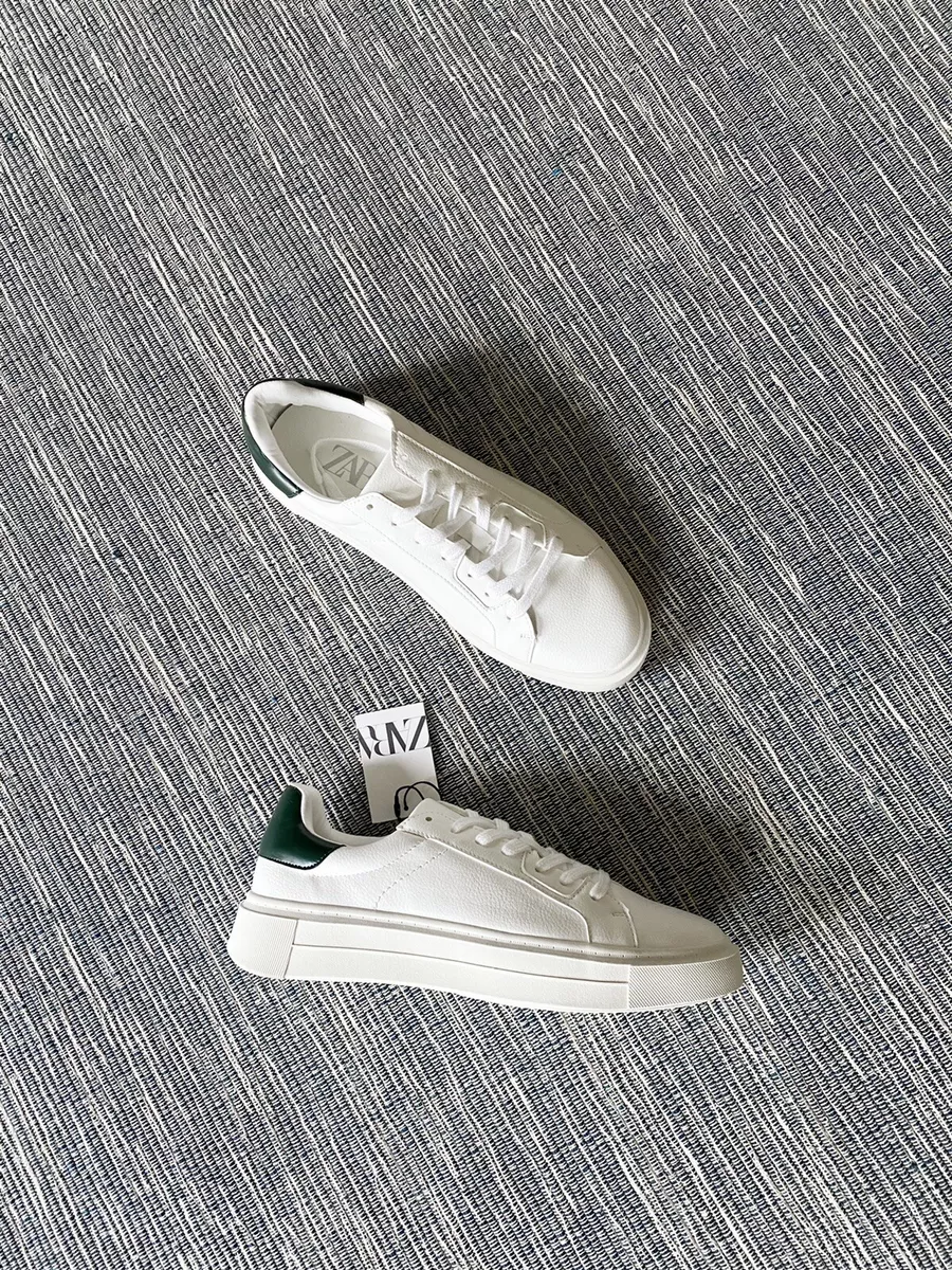 White sneakers with green back cheap