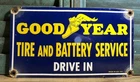 VINTAGE 1957 DATED GOOD YEAR TIRE BATTERY 12” PORCELAIN DRIVE IN GAS OIL SIGN