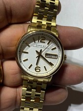 Ladies Gold Tone Marc By Marc Jacobs MBM8647 Analog Watch With Day/Date Feature