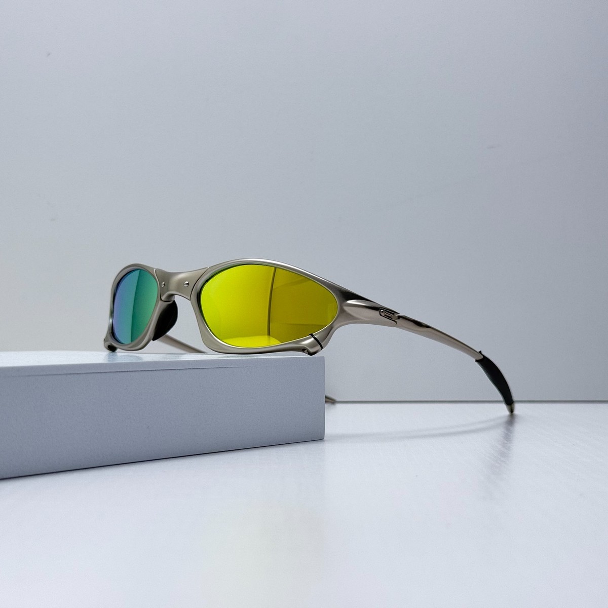 Oakley Penny X-Metal Sunglasses Silver Frame Yellow Iridium Lens