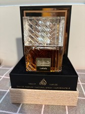 Lattafa Khamrah 3.4 fl oz Unisex Eau de Parfum with stand but no top cover 