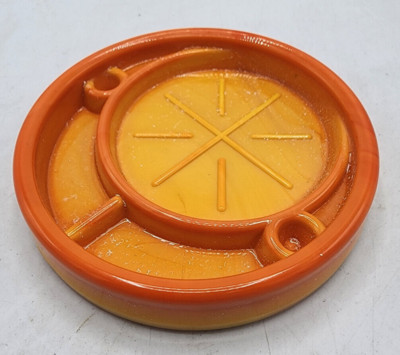 CANDY CORN COASTER in room light is Orange/Yellow under UV black light is purple