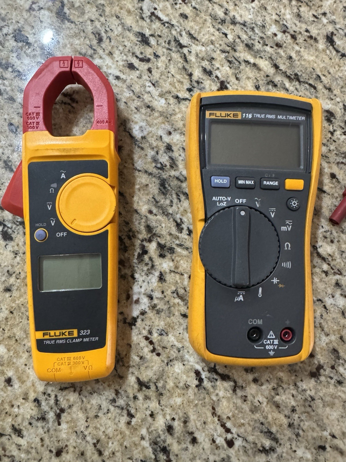 Fluke 116 True RMS Multimeter and Fluke 323 True RMS Clamp Meter with leads