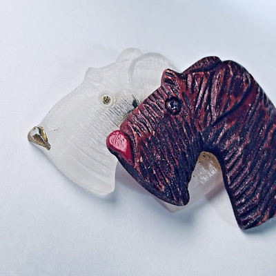 2 Layers of carved Scottie Terrier dog profiles 1 Lucite 1 wood vintage brooch
