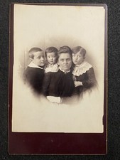 Mother And 3 Cute Children In Studio Antique Cabinet Photo