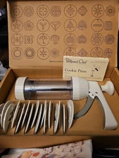 The Pampered Chef 1525 Cookie Press with 16 Discs - White