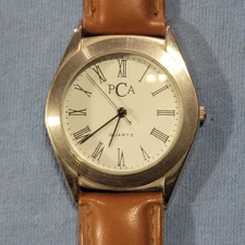 PCA Quartz Watch Silver Tone Case Roman Numerals Brown Leather Strap New Battery