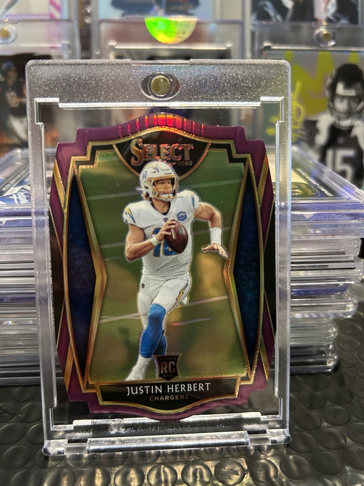 2020 Panini Select - Premier Level Justin Herbert #144 Purple Prizm Die-Cut (RC)