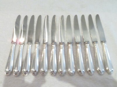 12 GRANDS COUTEAUX DE TABLE ART DECO de ORBRILLE JOSEPH BUISSON métal 12 GRANDS COUTEAUX DE TABLE ART DECO de ORBRILLE JOSEPH BUISSON métal