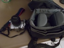 RZ CANON EOS REBEL 77 CAMERA W/LEMS CAP STRAP AND BAG