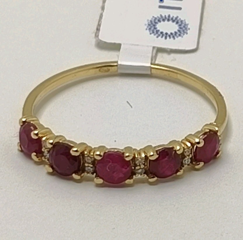 Sortija oro 18k 750 mls. Con 5 Rubíes 3 MM. Y 12 Diamantes 0,048 Q.
