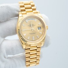 Rolex Day-Date 40mm Factory Champagne Baguette Diamond Watch 228238