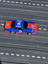 ROKAR M CAR GOODYEAR STP OLDSMOBILE STOCKER # 9 HO SLOT CAR 