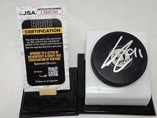 LEO CARLSSON signed DUCKS puck JSA COA